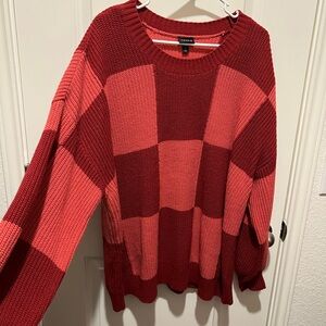 Torrid Red Crew Neck Sweater with Bold Checkerboard Design